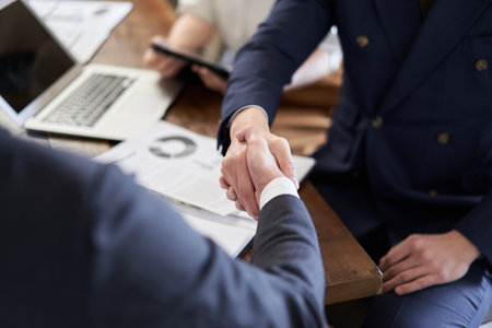 Asian businessman shaking hands