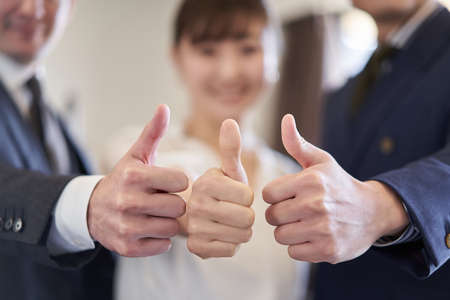 Asian business person who signs good signの写真素材