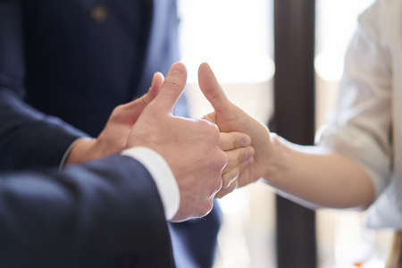 Asian business person who signs good signの写真素材