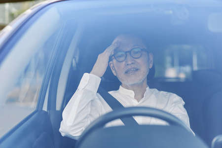 Elderly driver inadvertently causing troubleの写真素材