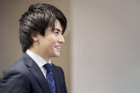 Profile of Asian businessman being interviewedの写真素材