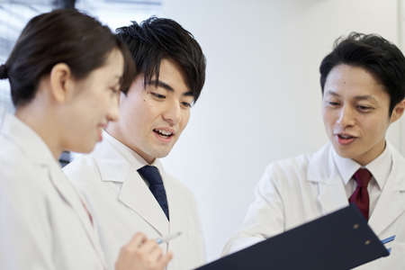 Asian medical personnel having a meetingの写真素材