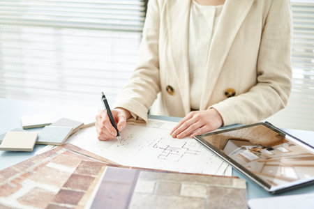 Asian interior designer thinking about home interiorの写真素材