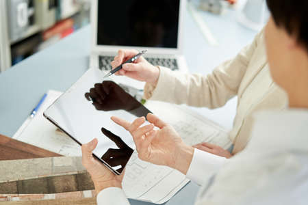 Asian interior designer thinking about home interiorの写真素材