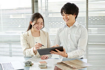 Asian interior designer thinking about home interiorの写真素材