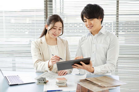 Asian interior designer thinking about home interior