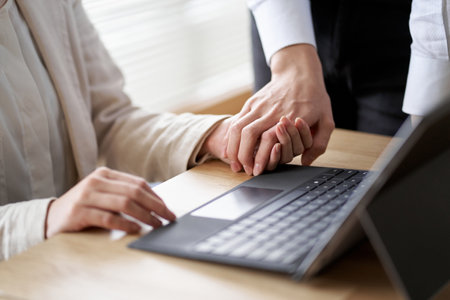 At the hands of an Asian man who has a romance in the company