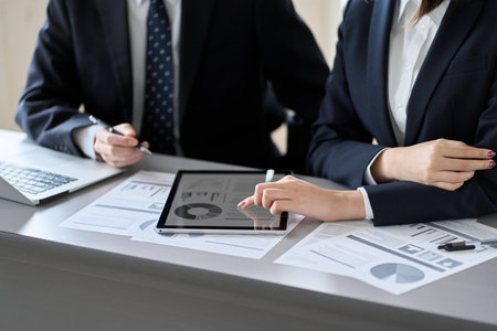 Asian business person having a meeting with a tabletの写真素材