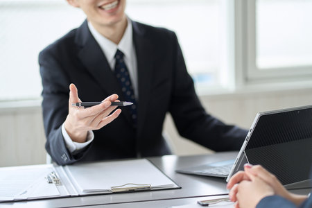 Asian business people having a meeting in a conference roomの写真素材