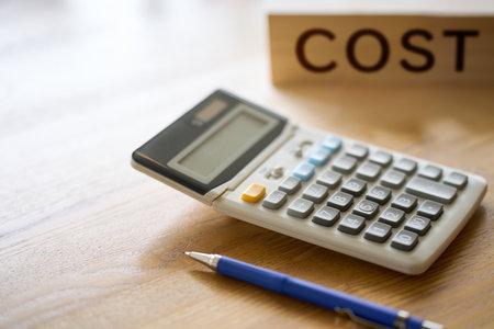 Image of a calculator for calculating costsの写真素材