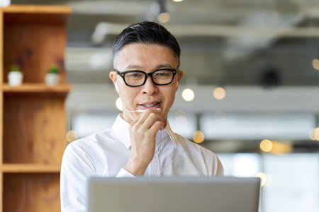 Asian businessmen having an online meetingの写真素材