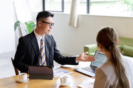 Asian business people having a meetingの写真素材