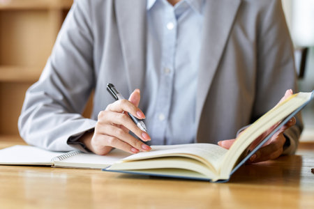 Business woman studying at a cafeの写真素材