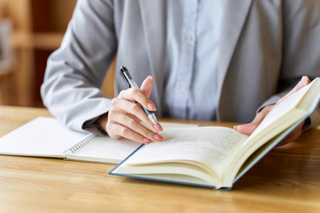 Business woman studying at a cafeの写真素材