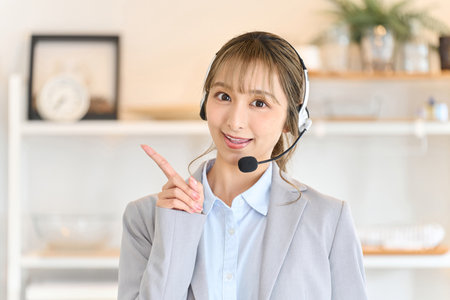 A real estate sales woman responding to inquiriesの写真素材