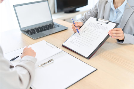 Business woman giving information on contractの写真素材