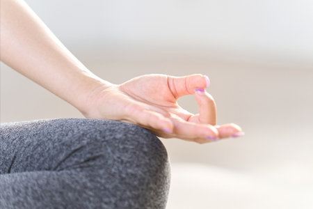 Hands of a meditating womanの写真素材