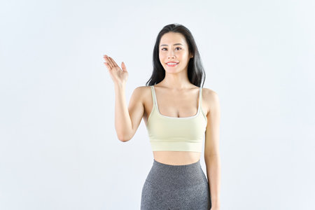 A woman wearing sportswear giving guidanceの写真素材