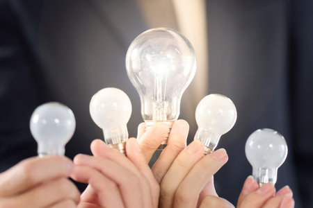 Figurative expression of managers and employees using light bulbs