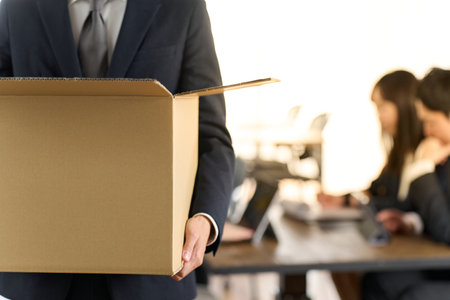 Businessman retiring and leaving the office