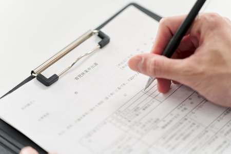 Businessman filling out parental leave application form