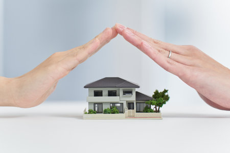 The hands of a couple looking after the houseの写真素材