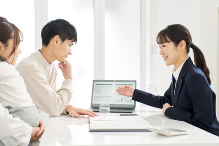Business woman giving information about insuranceの写真素材