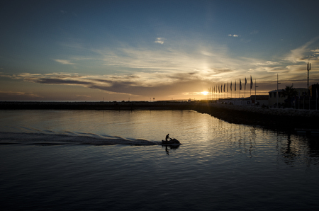 Jet-ski returning from his ride in Vilamouraの写真素材