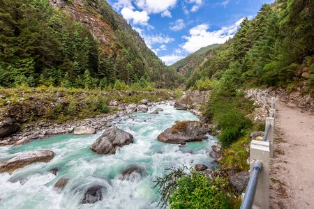 suspention bridge on the Everest Base Camp Trek, Himalaya mountains, Sagarmatha National Park, Nepal. Amazing river.の写真素材