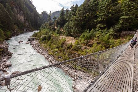 suspention bridge on the Everest Base Camp Trek, Himalaya mountains, Sagarmatha National Park,...