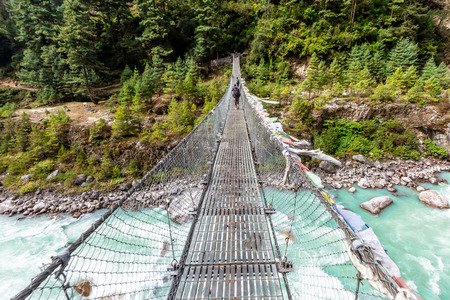 suspention bridge on the Everest Base Camp Trek, Himalaya mountains, Sagarmatha National Park,...