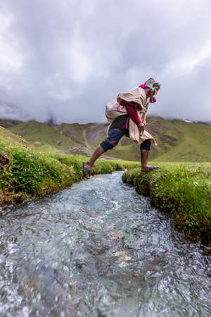 Cuzco, Peru - March 25, 2019. Religious ceremony of Peruvian culture held in the mountains of Cuzco.のeditorial素材