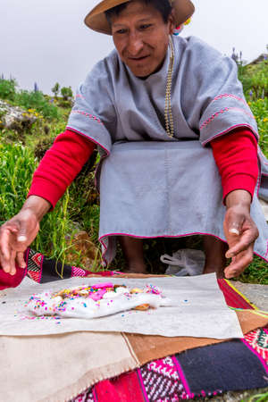 Cuzco, Peru - March 25, 2019. Religious ceremony of Peruvian culture held in the mountains of Cuzco.のeditorial素材