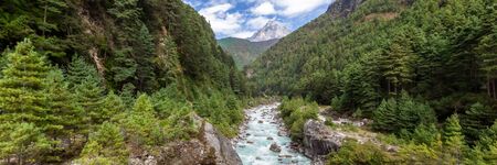 Suspention bridge on the Everest Base Camp Trek, Himalaya mountains, Sagarmatha National Park, Nepal. Web banner in panoramic view.の写真素材