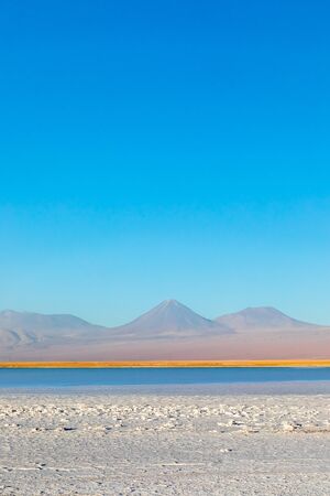 Cejar lagoon and Licancabur volcano in Atacama, Chile. South America.の写真素材