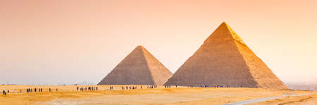 The pyramids at Giza in Egypt. Web banner in panoramic view. Africa.