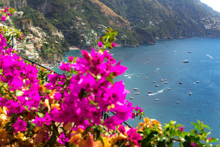 Positano in Amalfi Coast, Mediterranean Sea, Italy. Beautiful day full of colors on the roads and highways of the Amalfi Coast.の写真素材