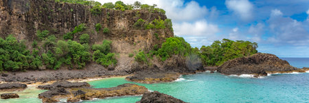 Fernando de Noronha, Brazil. Turquoise water around the Two Brothers rocks, UNESCO World Heritage...