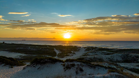 FlorianÃ³polis, Campeche beach during sunrise. Brazil. Rio Tavares neighborhood.の写真素材