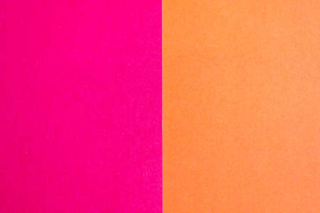 colored pieces of paper orange and pink symmetryの写真素材