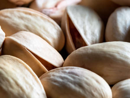 a few pistachio nuts up close in high definition