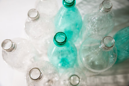several empty plastic bottles with water drops. ecology, recyclingの写真素材