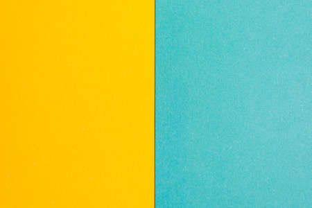 Blue and yellow paper texture for interesting and modern background.