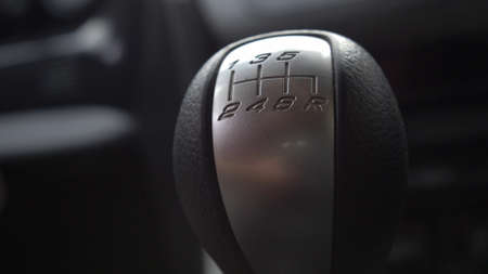 Driver Changing Gears with Manual Transmission Gear Stick