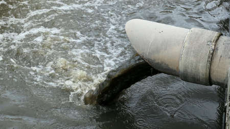 Sewage Farm Waste Water Flowing From Pipe