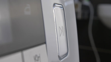 Pressing Play Pause Button on the Device Multiple Times Close-Upの写真素材