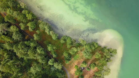 Aerial View of Peninsula on Turquoise Green Water Lake