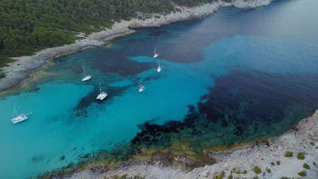 Aerial of Boats and Yachts on Turquoise Mediterranean Sea in Mallorcaの写真素材