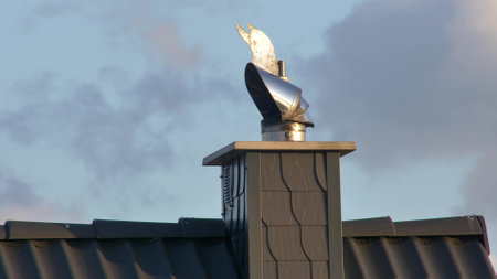 Wind Directional Cowl on Chimney Rotating Gently on Windの写真素材