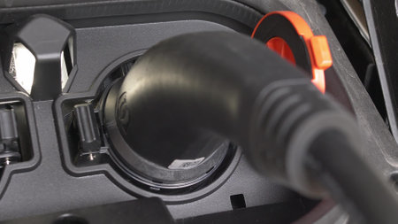 Charging Electric Car With Type 2 Charging Plug Interface Close-Up